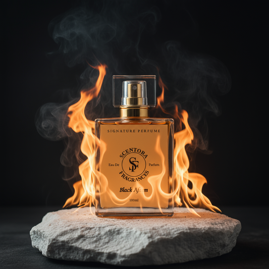 Black Afeem 100ml perfume bottle with gold label on a stone, surrounded by flames.