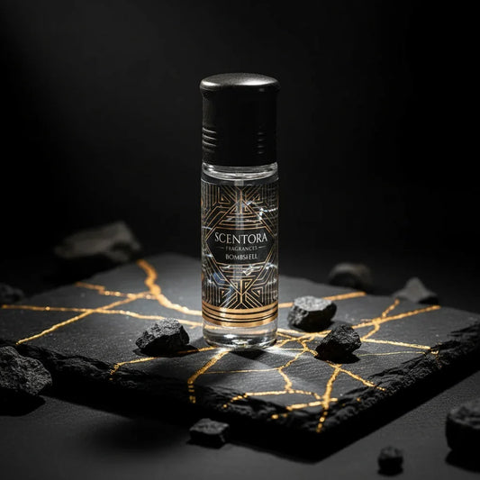 Scentora Bombshell roll-on perfume oil bottle on black stone with gold veins, luxury fragrance